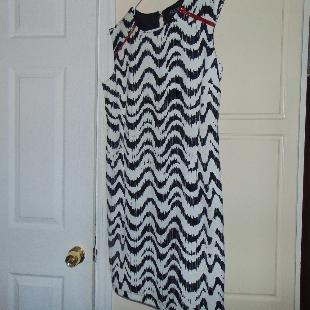 red zipper on shoulder dress